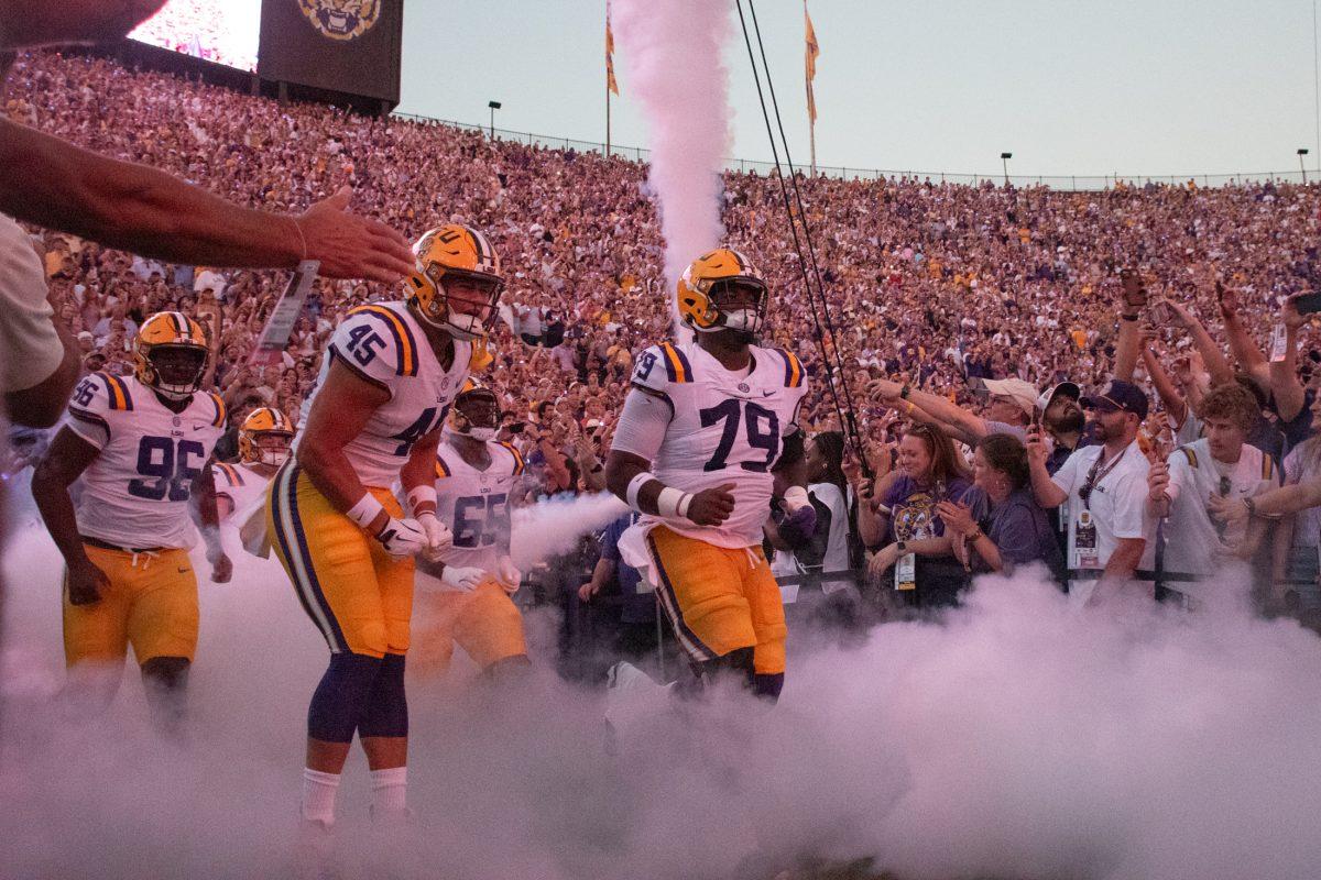 The LSU football team runs out of the tunnel on Saturday, Oct. 12, 2024, in anticipation of LSU's 29-26 win against Ole Miss in Tiger Stadium in Baton Rouge, La.