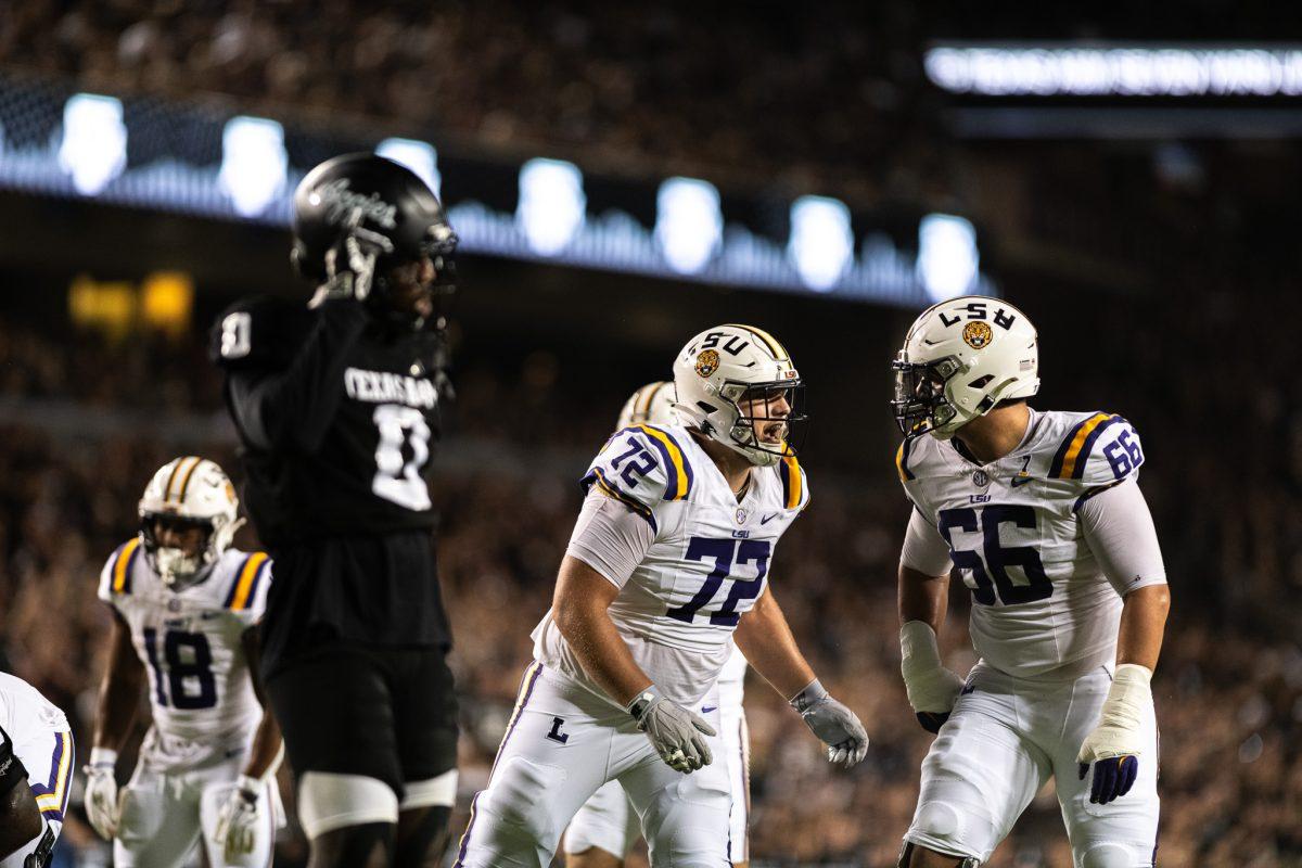 LSU football senior offensive line Garret Dellinger (72) and junior offensive tackle Will Campbell (66) discussing a play&#160;on Saturday, Oct. 26, 2024, during LSU's 23-38 loss against Texas A&amp;M at Kyle Field in College Station, Texas.&#160;