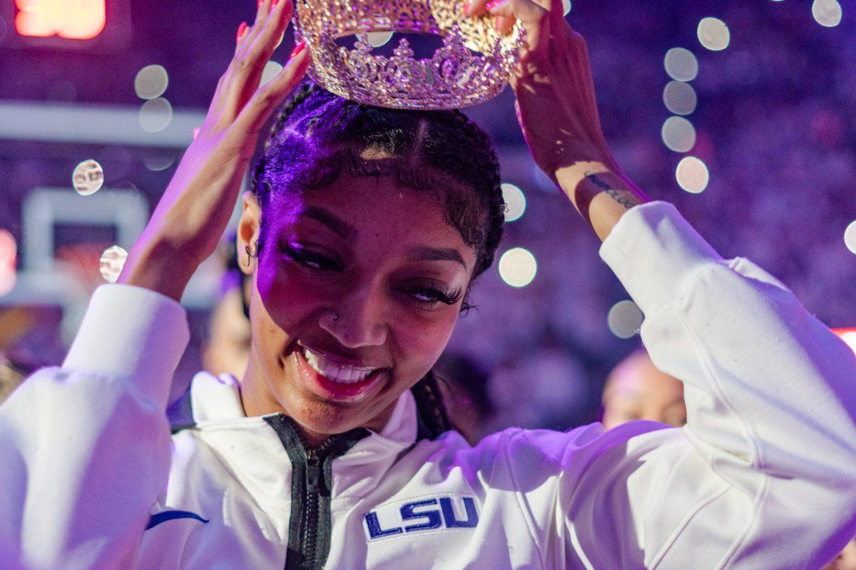 LSU women&#8217;s basketball junior forward Angel Reese (10) puts on a crown Thursday, Jan. 25, 2024, prior to LSU&#8217;s 76-70 loss against South Carolina in the Pete Maravich Assembly Center in Baton Rouge, La.