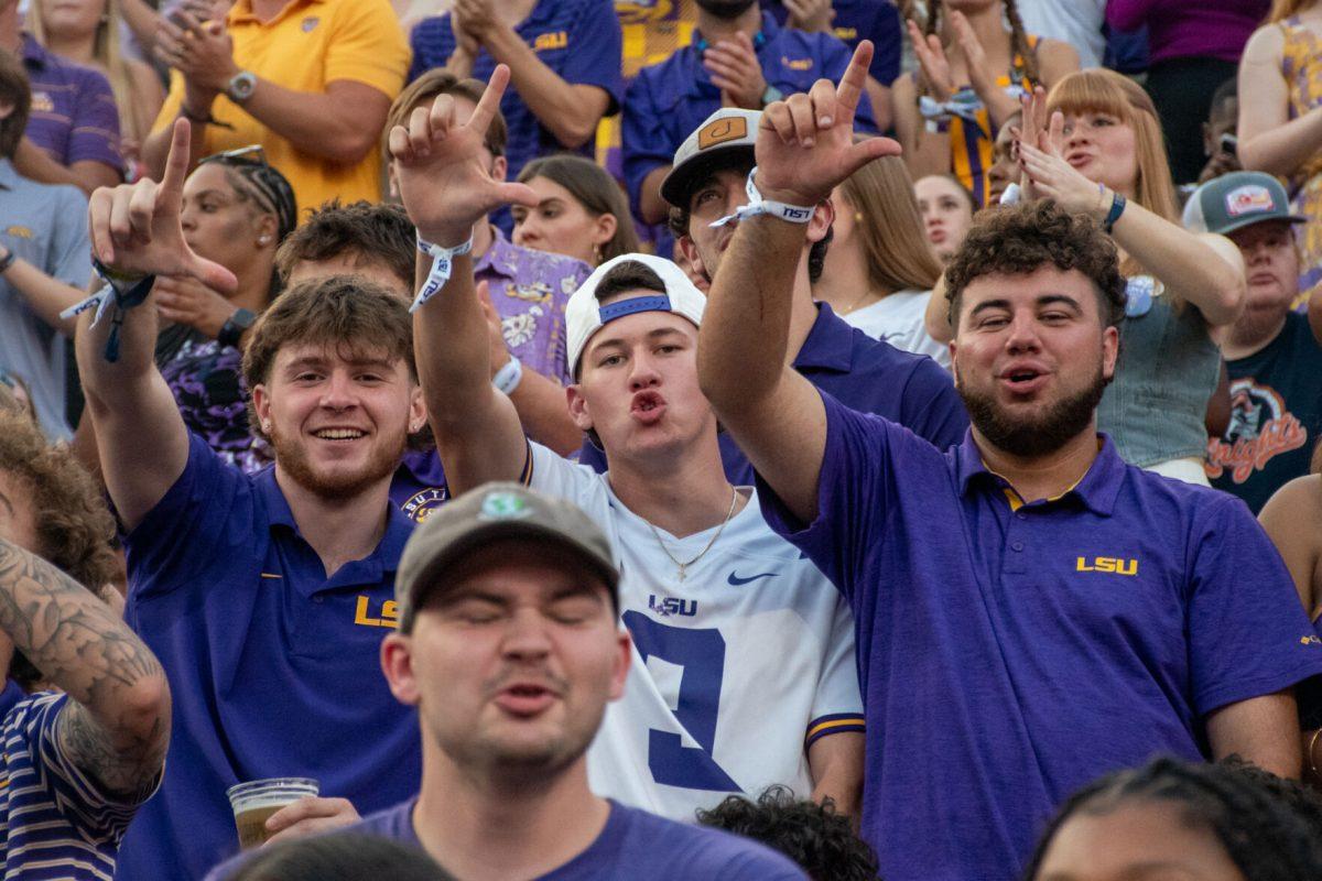 Death Valley's student section hold up L's during pregame in Tiger Stadium on Oct. 12, 2024, in Baton Rouge, La.