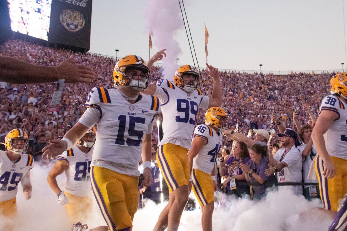 The Tigers football team runs out of the tunnel on Oct. 12, 2024, in anticipation of LSU's 29-26 win against Ole Miss in Tiger Stadium in Baton Rouge, La.