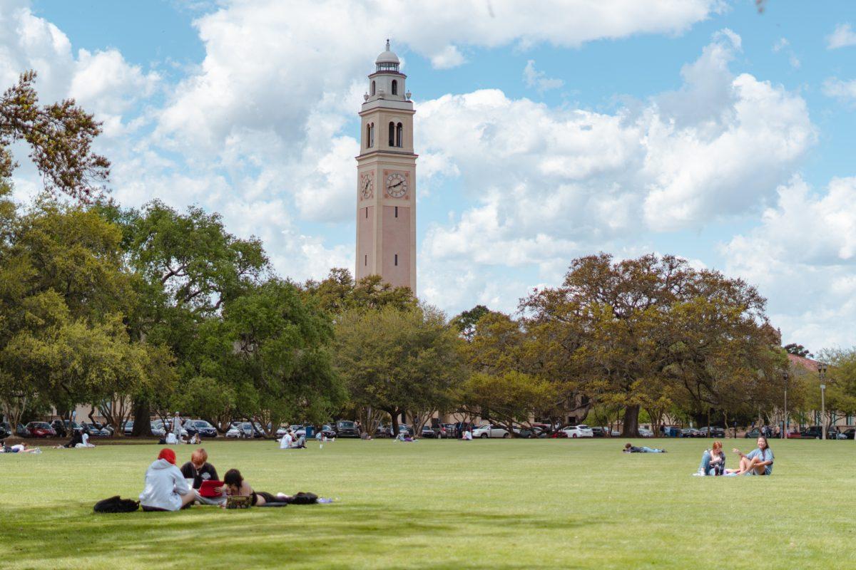 Students lounge about on Thursday, March 24, 2022, on the LSU Parade Ground on Highland Road in Baton Rouge, La.