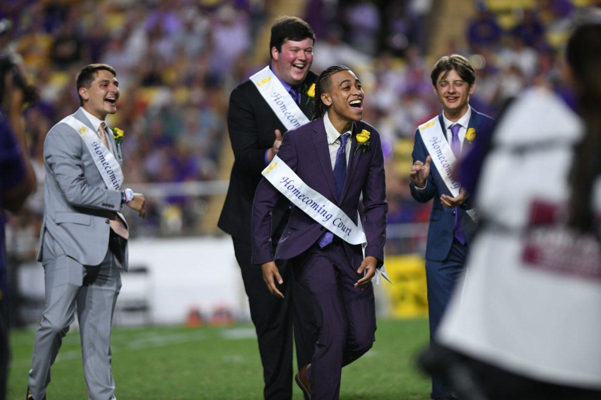 LSU's 2024 Homecoming King Brian Gage celebrates his new title as King in Tiger Stadium on Saturday, Oct. 12, 2024, in Baton Rouge, La.