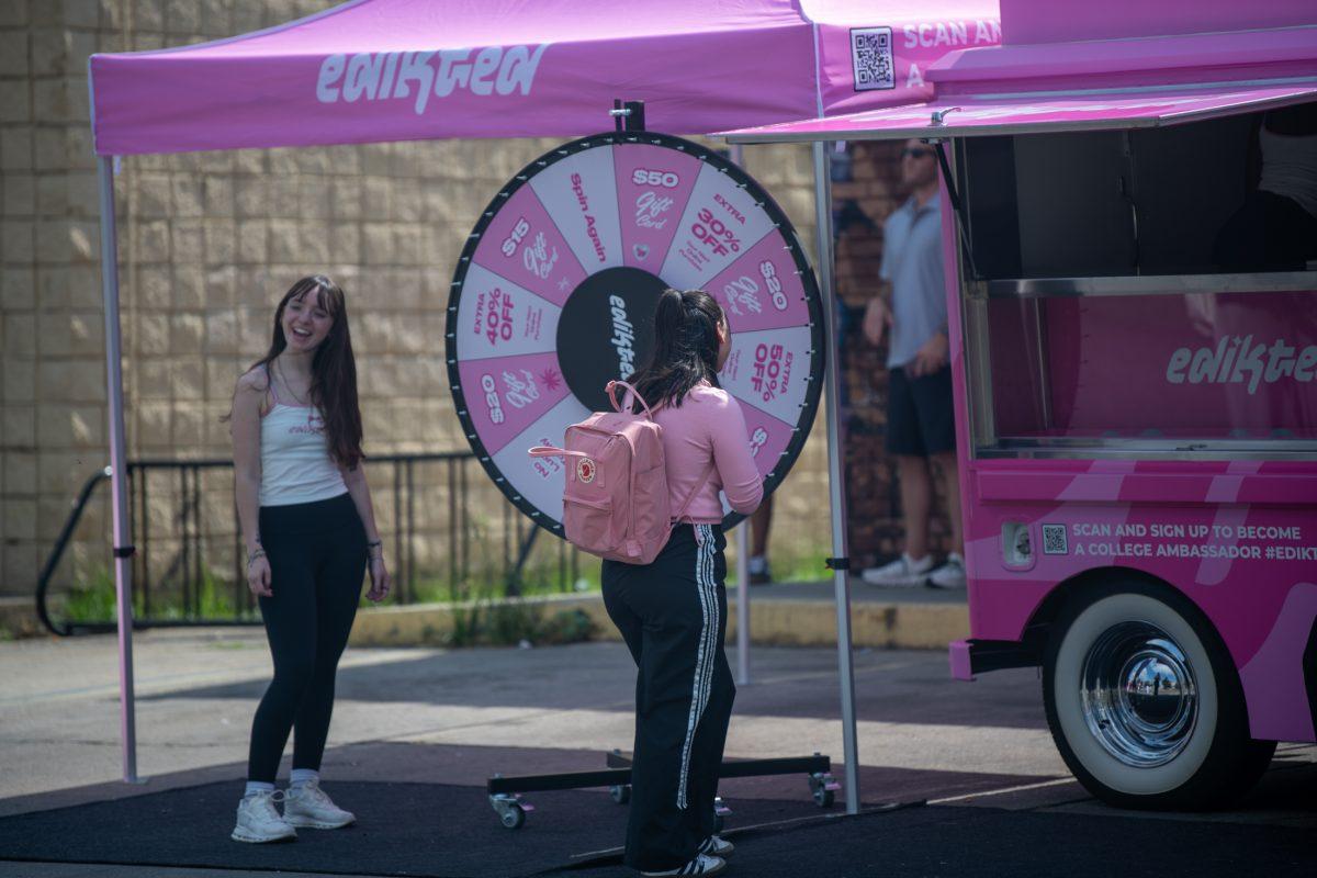 LSU students enjoy a Edikted pop-up shop Tuesday, Oct. 15, 2024, on West State Street in Baton Rouge, La.