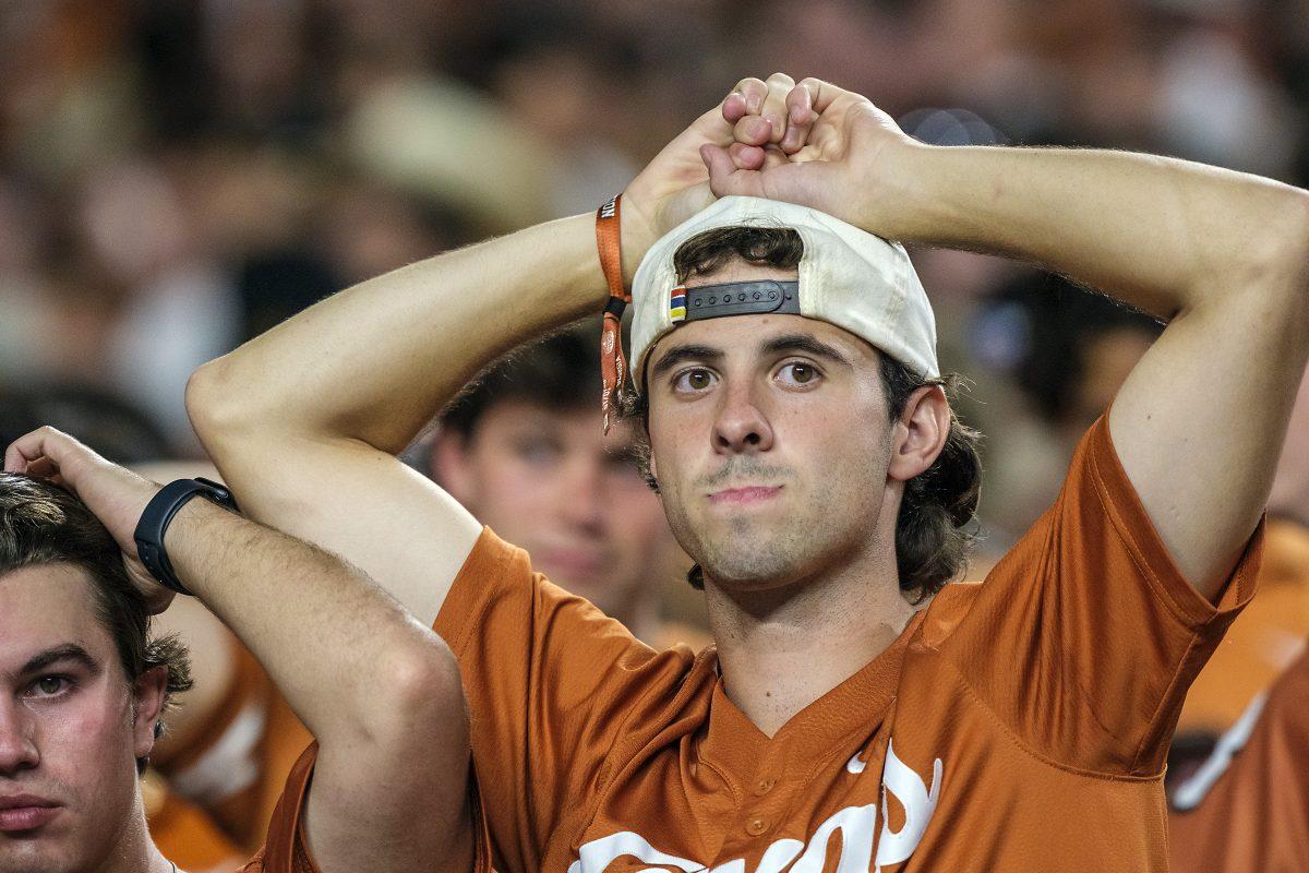 Texas fans watch the clock run out during the second half of an NCAA college football game against Georgia in Austin, Texas, Saturday, Oct. 19, 2024.