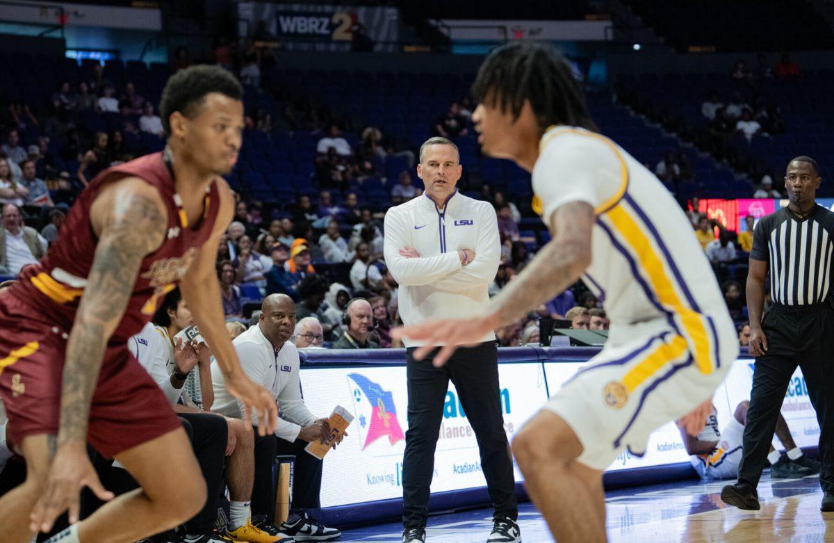 LSU men's basketball head coach Matt McMahon watches intently during LSU's 110-48 exhibition win against Loyola on Tuesday, Oct. 29, 2024, in the Pete Maravich Assembly Center in Baton Rouge, La.