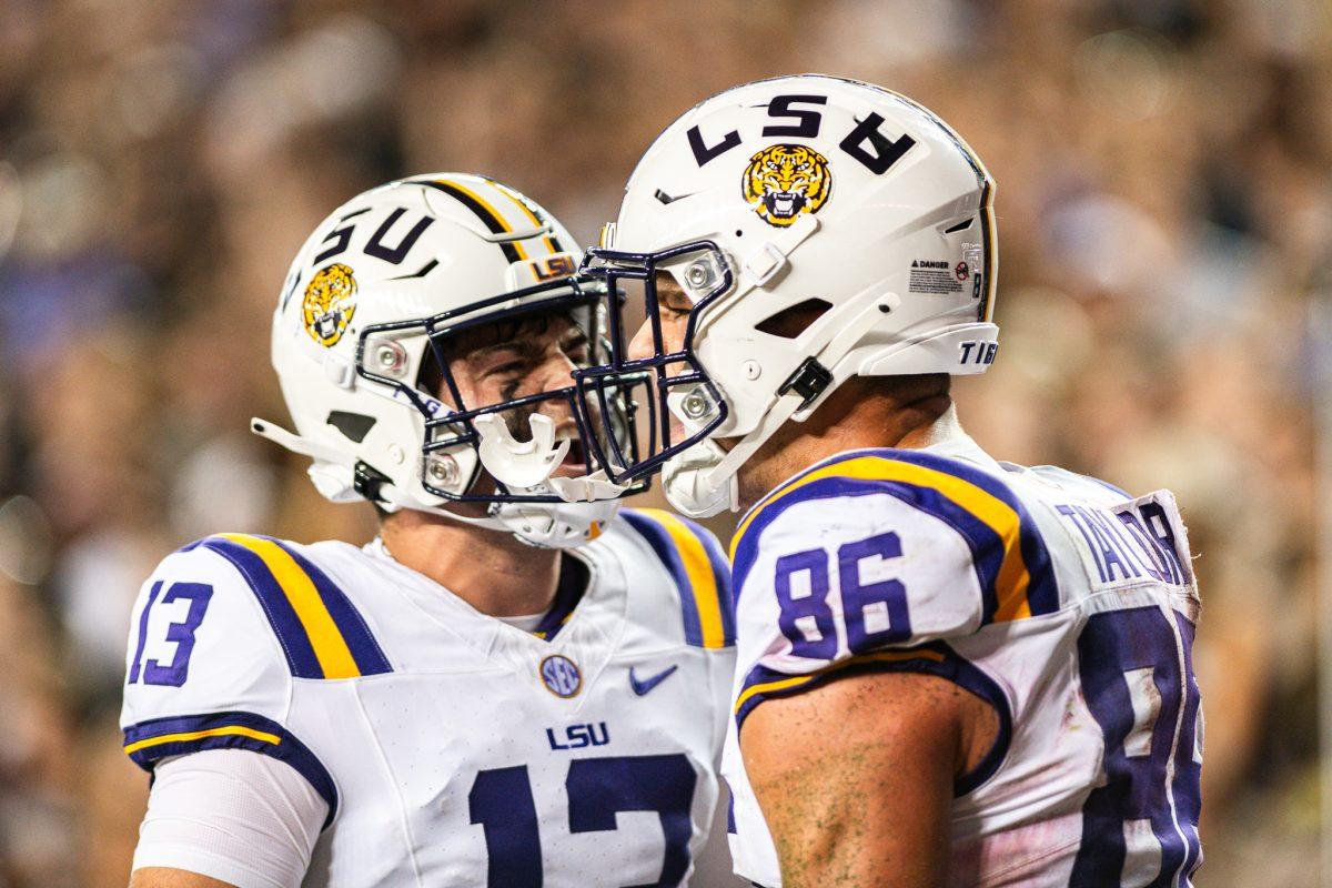 LSU football junior tight end Mason Taylor (86) and redshirt junior quarterback Garrett Nussmeier (13) celebrating LSU's first touchdown of the game&#160;on Saturday, Oct. 26, 2024, during LSU's 23-38 loss against Texas A&amp;M at Kyle Field in College Station, Texas.&#160;