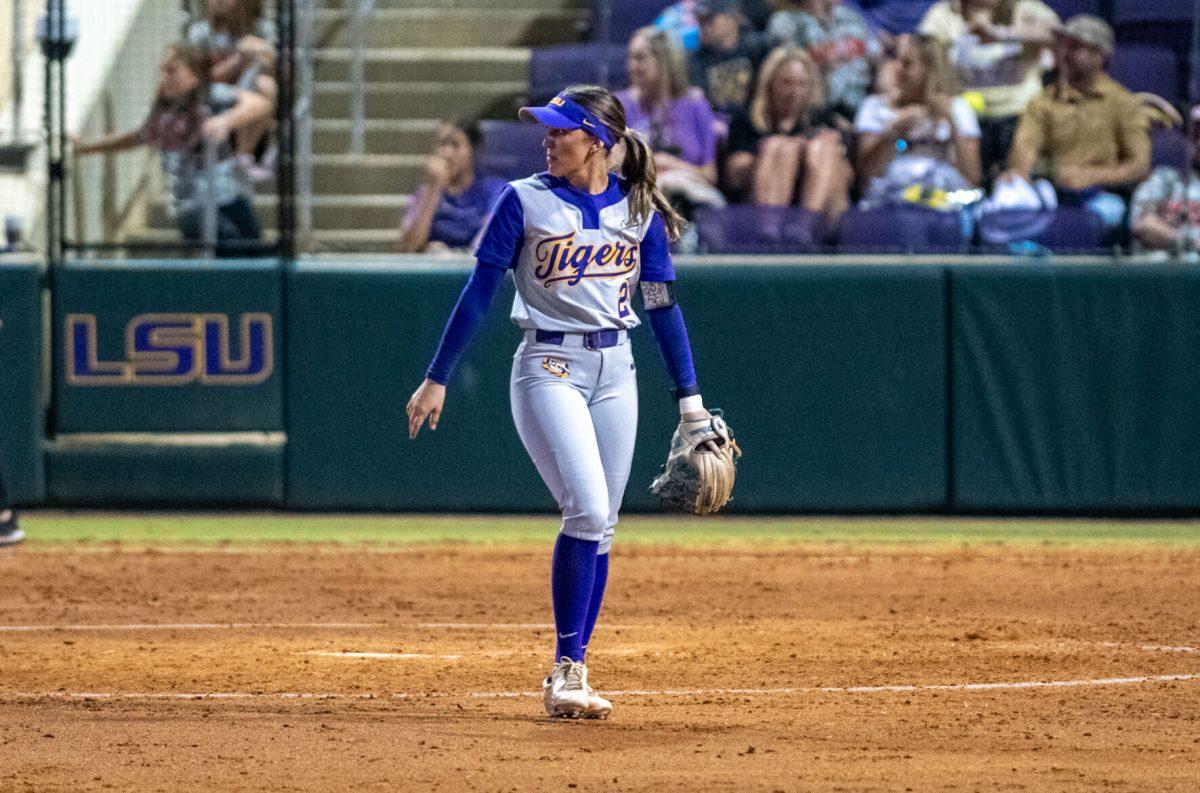 LSU softball sophomore utility Maddox McKee (2) walks on the field Wednesday, Oct. 23, 2024, during LSU's exhibition game against Southeastern at Tiger Park in Baton Rouge, La.