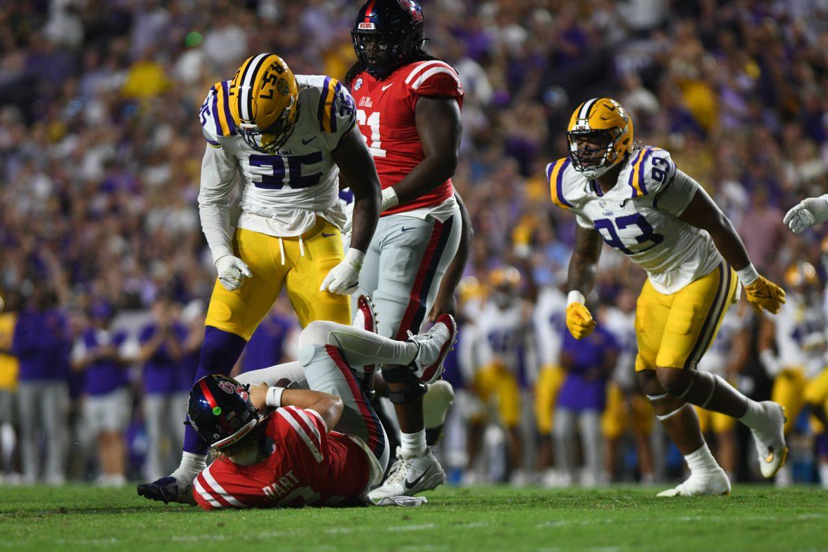 LSU football senior defense Sai'vion Jones (35) celebrates a tackle in Tiger Stadium during LSU's 29-26 win against Ole Miss on Saturday, Oct. 12, 2024, in Baton Rouge, La.