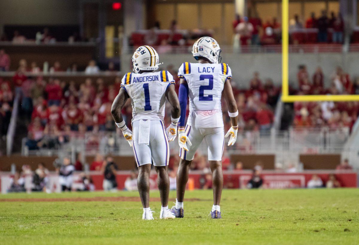 LSU football redshirt sophomore wide receiver Aaron Anderson (1) and 5th-year-senior wide receiver Kyren Lacy (2) stand on the field awaiting play Saturday, Oct. 19, 2024, during LSU&#8217;s 34-10 win against Arkansas at Donald W. Reynolds Razorback Stadium on North Razorback Road in Fayetteville, Ar.