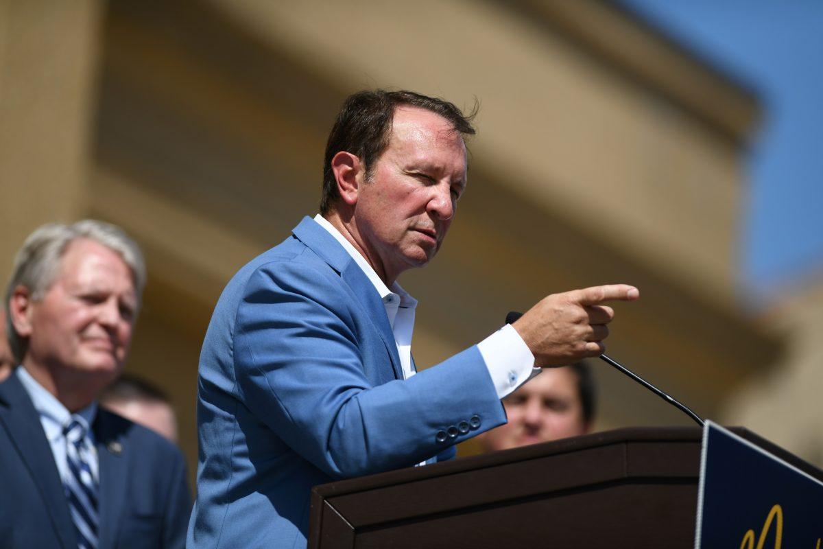 Louisiana Governor Jeff Landry points at the crowd on Tuesday, Oct. 1, 2024, outside of the LSU Memorial Tower on Dalrymple Dr in Baton Rouge, La.&#160;