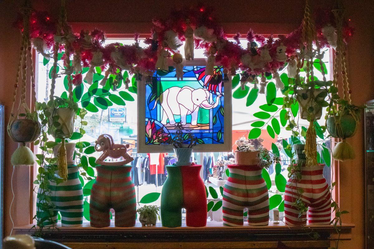 A pink stained-glass elephant sits in a window Saturday, Nov. 16, 2024, at The Pink Elephant Antiques in Baton Rouge, La.