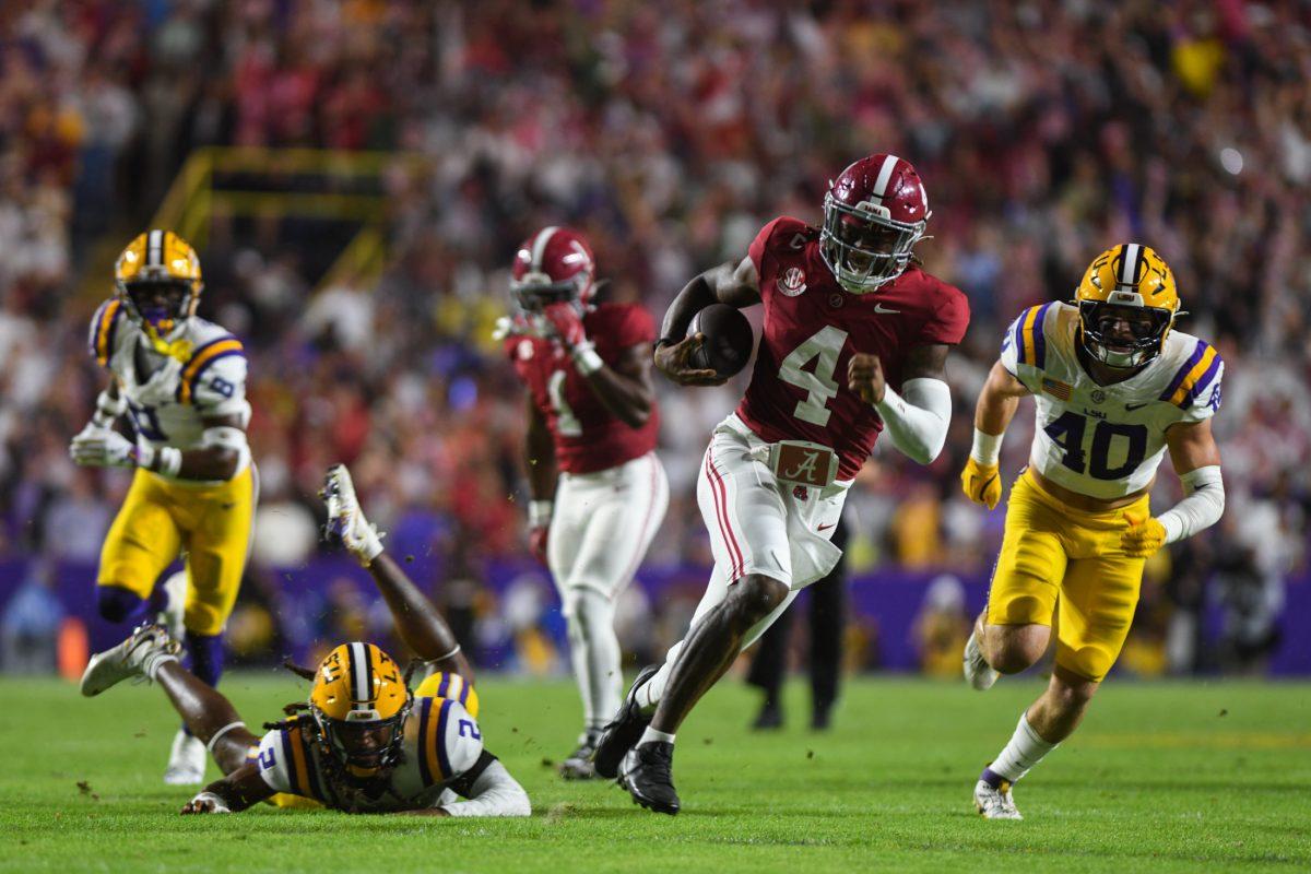 Alabama quarterback Jalen Milroe (4) runs with the ball on Saturday, Nov. 9, 2024, during LSU&#8217;s 42-13 loss to Alabama at Tiger Stadium in Baton Rouge, La.