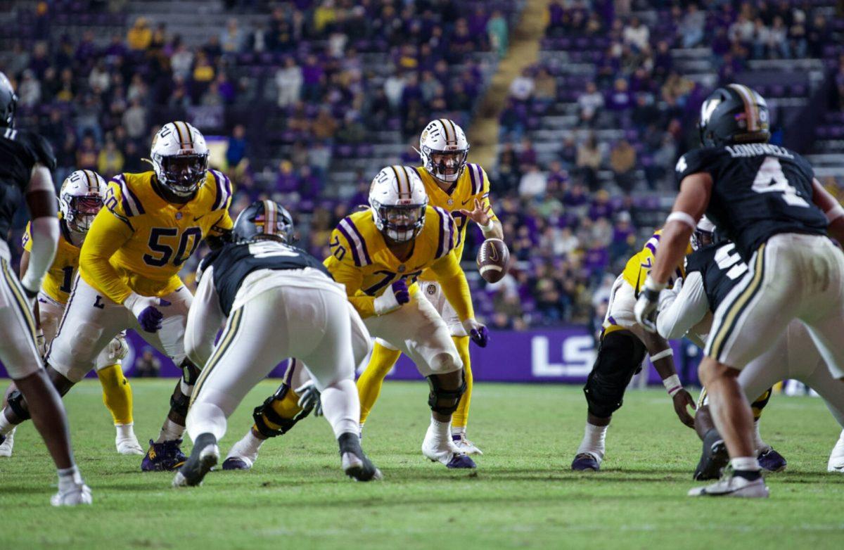 LSU football redshirt junior quarterback Garrett Nussmeier (13) looks to catch a snap Saturday, Nov. 24, 2024, during LSU’s 24-17 win against Vanderbilt at Tiger Stadium in Baton Rouge, La.