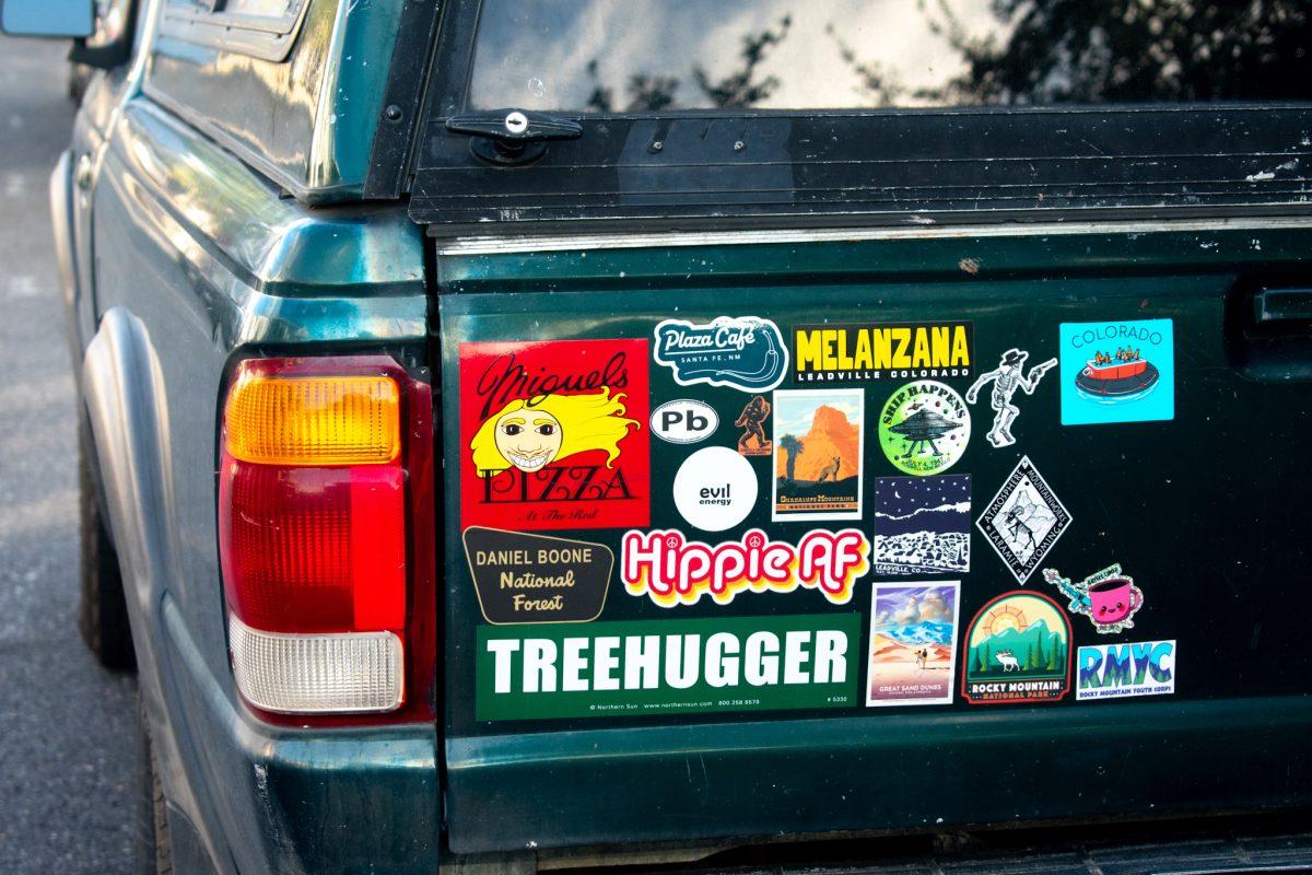 A car adorned with a colorful array of bumper stickers is spotted near Cedar Hall on LSU's campus in Baton Rouge, La, on Nov. 18, 2024.