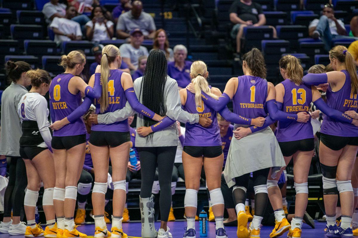 LSU volleyball players discuss strategies during a timeout on Friday, Sept. 20, 2024, during LSU’s 3-0 loss to the San Diego in the Pete Maravich Assembly Center in Baton Rouge, La.