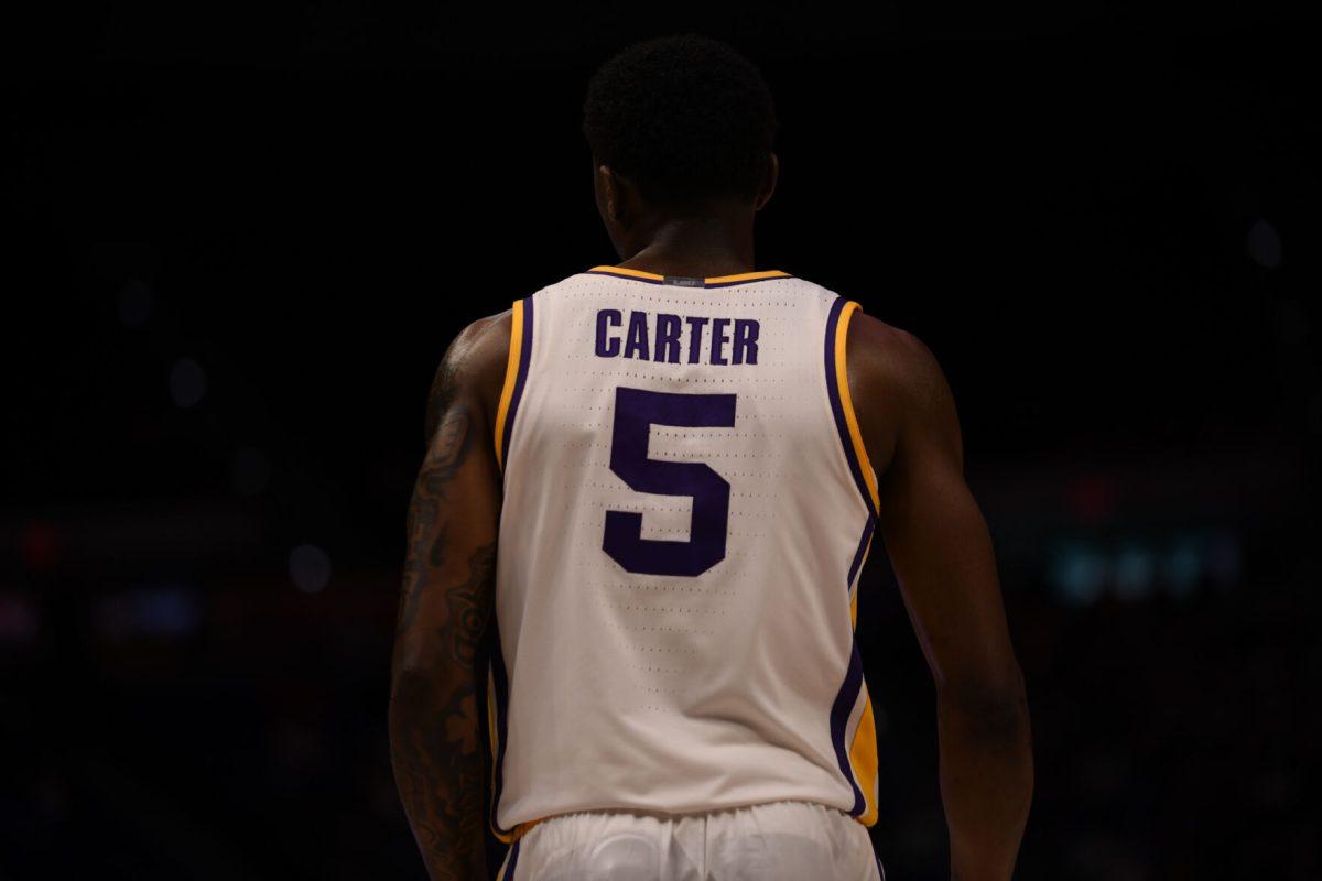 LSU men's basketball senior guard Cam Carter (5) watches his teammates guard the ball during their season opening 95-60 win against University of Louisiana at Monroe on Wednesday, Nov. 6, 2024, in the Pete Maravich Assembly Center in Baton Rouge, La.