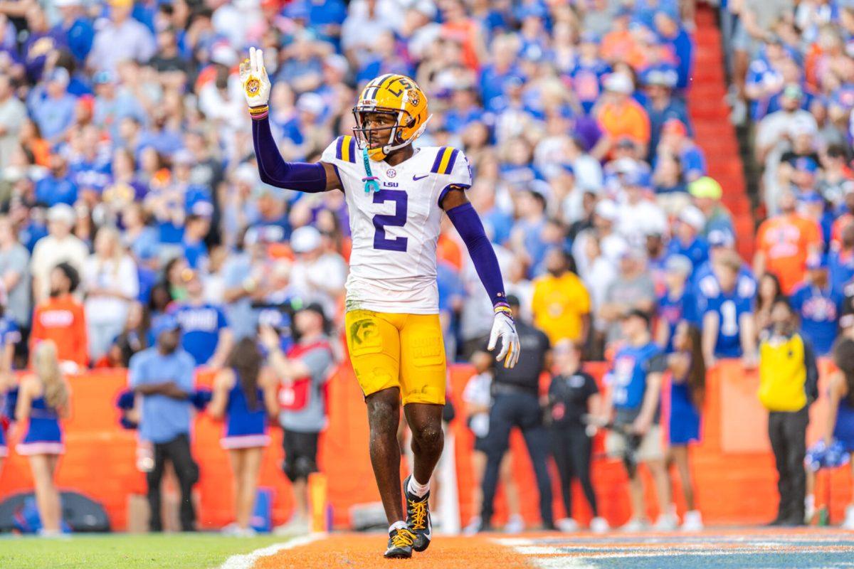 LSU football 5th-year senior wide receiver Kyren Lacy signals the team after missing a touchdown catch during LSU's 16-27 loss against the University of Florida on Saturday, Nov. 16, 2024, at Ben Hill Griffin Stadium in Gainesville, Fl.