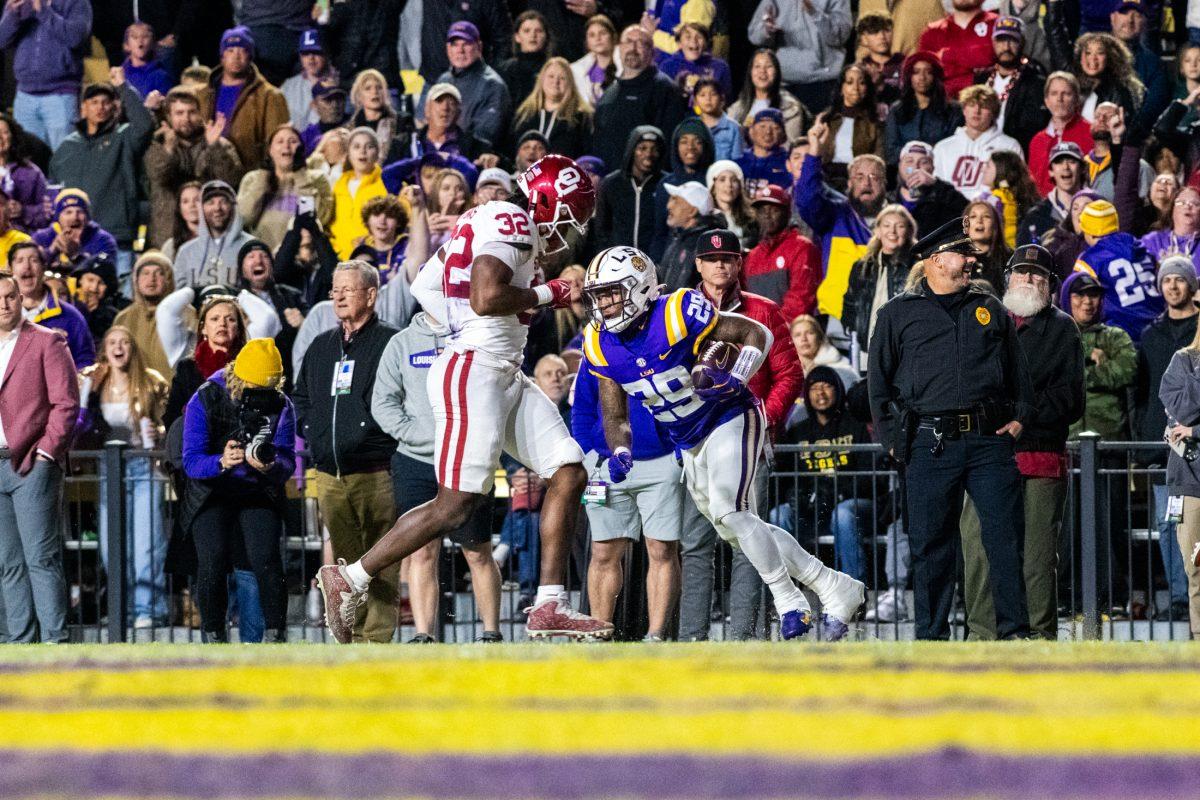 LSU football freshman running back Caden Durham (29) runs with the ball Saturday, Nov. 30, 2024, during the game against Oklahoma at Tiger Stadium in Baton Rouge, La.