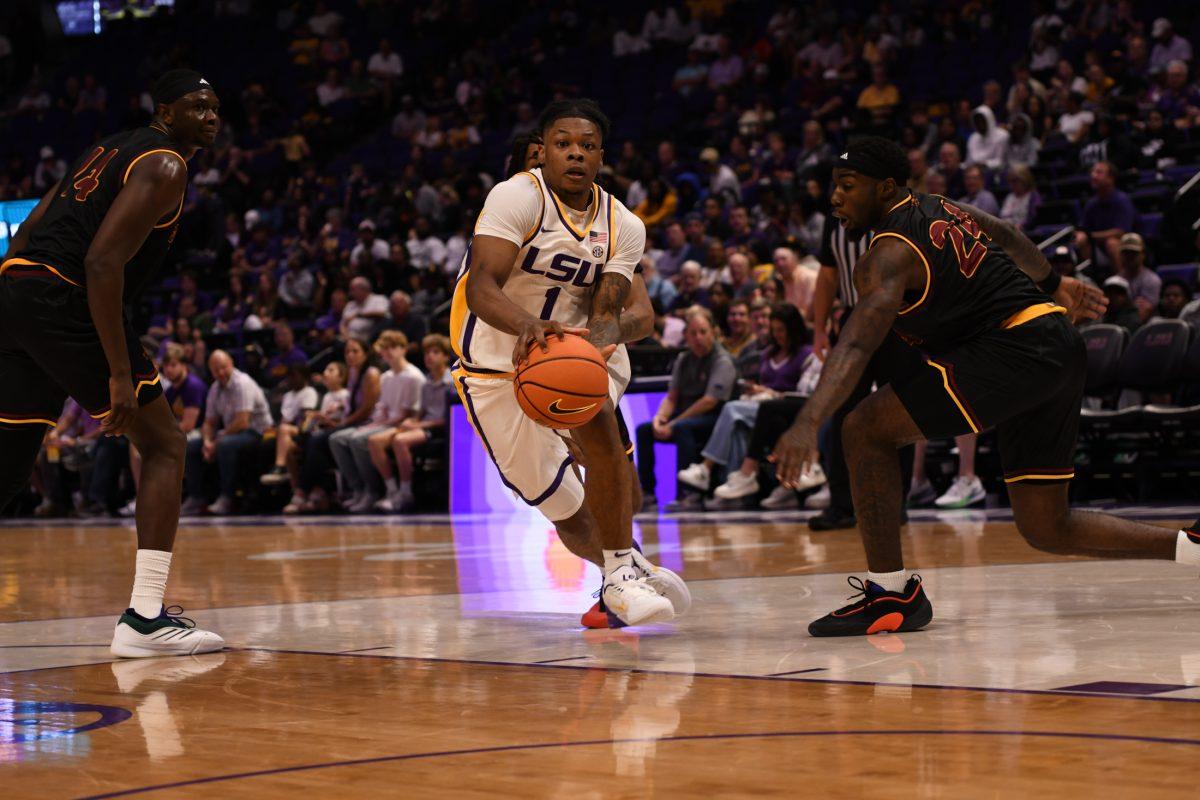 LSU men's basketball fifth-year senior guard Jordan Sears (1) runs past the ULM defense to shoot the ball during LSU's season opening 95-60 win against University of Louisiana at Monroe on Wednesday, Nov. 6, 2024, in the Pete Maravich Assembly Center in Baton Rouge, La.