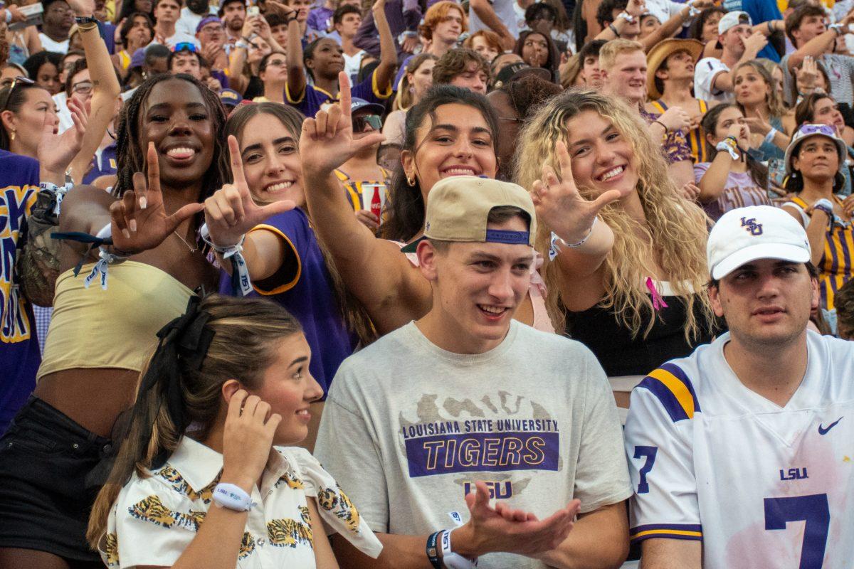 Death Valley's student section hold up L's during pregame in Tiger Stadium on Oct. 12, 2024, in Baton Rouge, La.