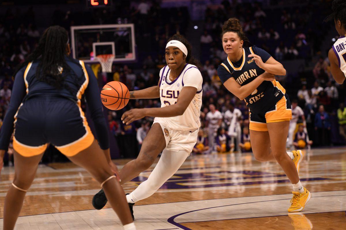 LSU women's basketball senior forward Aneesah Morrow (24) weaves through opponents during LSU's 60-74 win against Murray State on Friday Nov. 15, 2024, in the Pete Maravich Assembly Center in Baton Rouge, La.