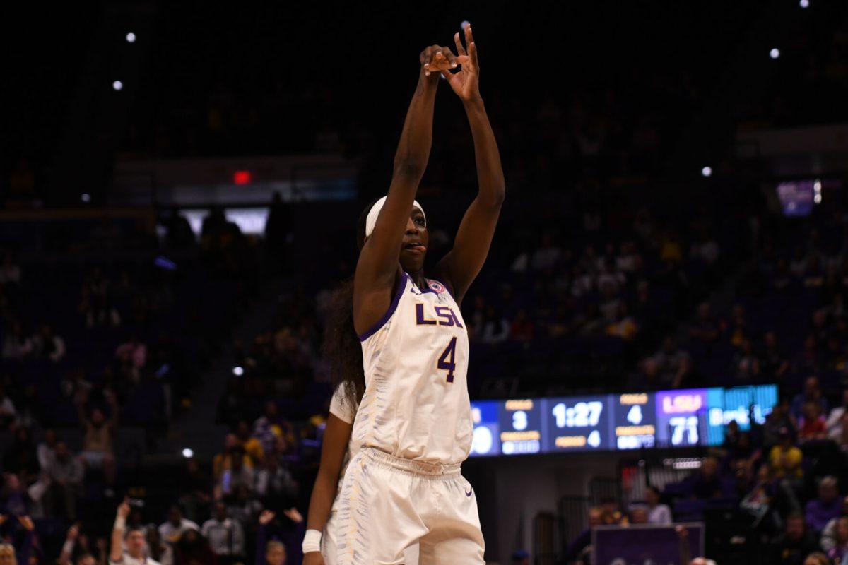 LSU women's basketball junior guard Flau'Jae Johnson (4) shoots the ball for a free point during LSU's 60-74 win against Murray State on Friday Nov. 15, 2024, in the Pete Maravich Assembly Center in Baton Rouge, La.