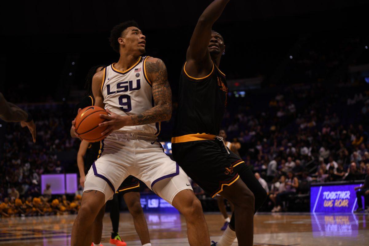 LSU men's basketball junior forward Jalen Reed (9) prepares to shoot the ball during LSU's season opening 95-60 win against University of Louisiana at Monroe on Wednesday, Nov. 6, 2024 in the Pete Maravich Assembly Center in Baton Rouge, La.