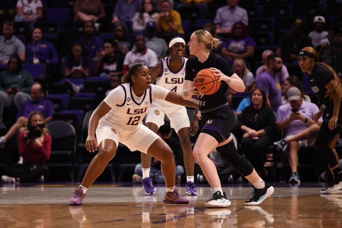 LSU women's basketball sophomore guard Mikaylah Williams (12) guards the opponent during LSU's 36-95 win against Northwestern State on Nov 8, 2024, in the Pete Maravich Assembly Center in Baton Rouge, La.