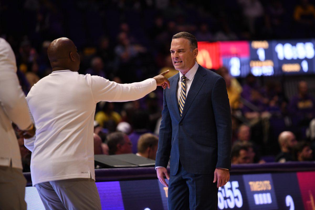 LSU men's basketball head coach Matt McMahon and associate head coach David Patrick discuss game strategy during their season opening 95-60 win against University of Louisiana at Monroe on Wednesday, Nov. 6, 2024, in the Pete Maravich Assembly Center in Baton Rouge, La.