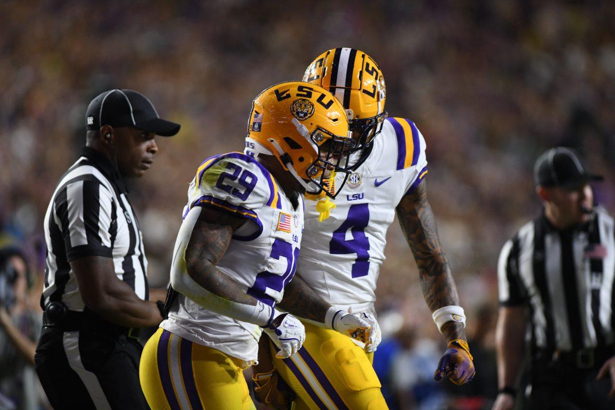 <p>LSU football freshman running back Caden Durham (29) and graduate student wide receiver CJ Daniels (4) run onto the field on Saturday, Nov. 9, 2024, during LSU’s 42-13 loss to Alabama at Tiger Stadium in Baton Rouge, La.</p>