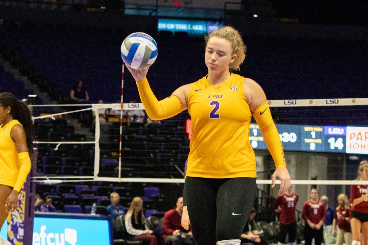 LSU volleyball setter graduate student Bailey Ortega (2) prepares to serve Saturday, Aug. 31, 2024, during LSU&#8217;s 2-3 loss to Troy in the Pete Maravich Assembly Center in Baton Rouge, La.