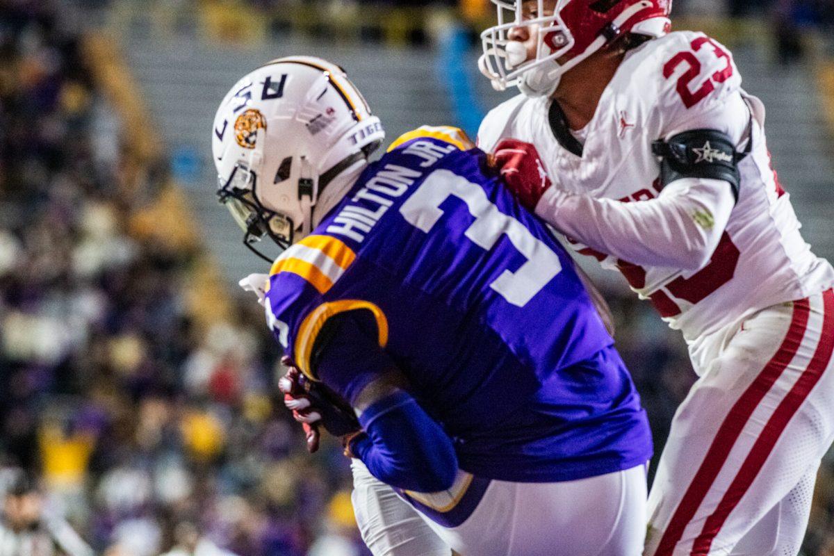 LSU football redshirt junior wide receiver Chris Hilton Jr. (3) catches the ball in the end zone to score a touchdown Saturday, Nov. 30, 2024, during the game against Oklahaoma at Tiger Stadium in Baton Rouge, La.