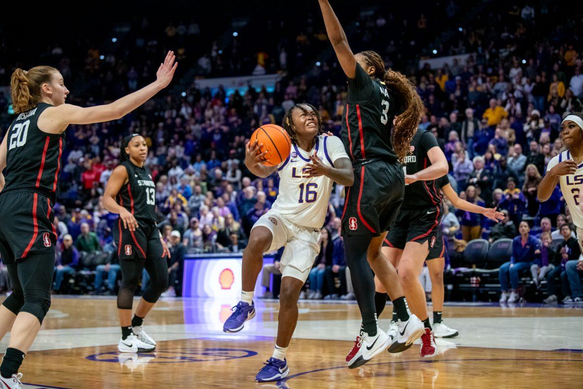 LSU women's basketball junior guard Kailyn Gilbert (16) attempts to take a shot during LSU's 94-88 overtime win against Stanford on Thursday, Dec. 5, 2024, in the Pete Maravich Assembly Center in Baton Rouge, La.