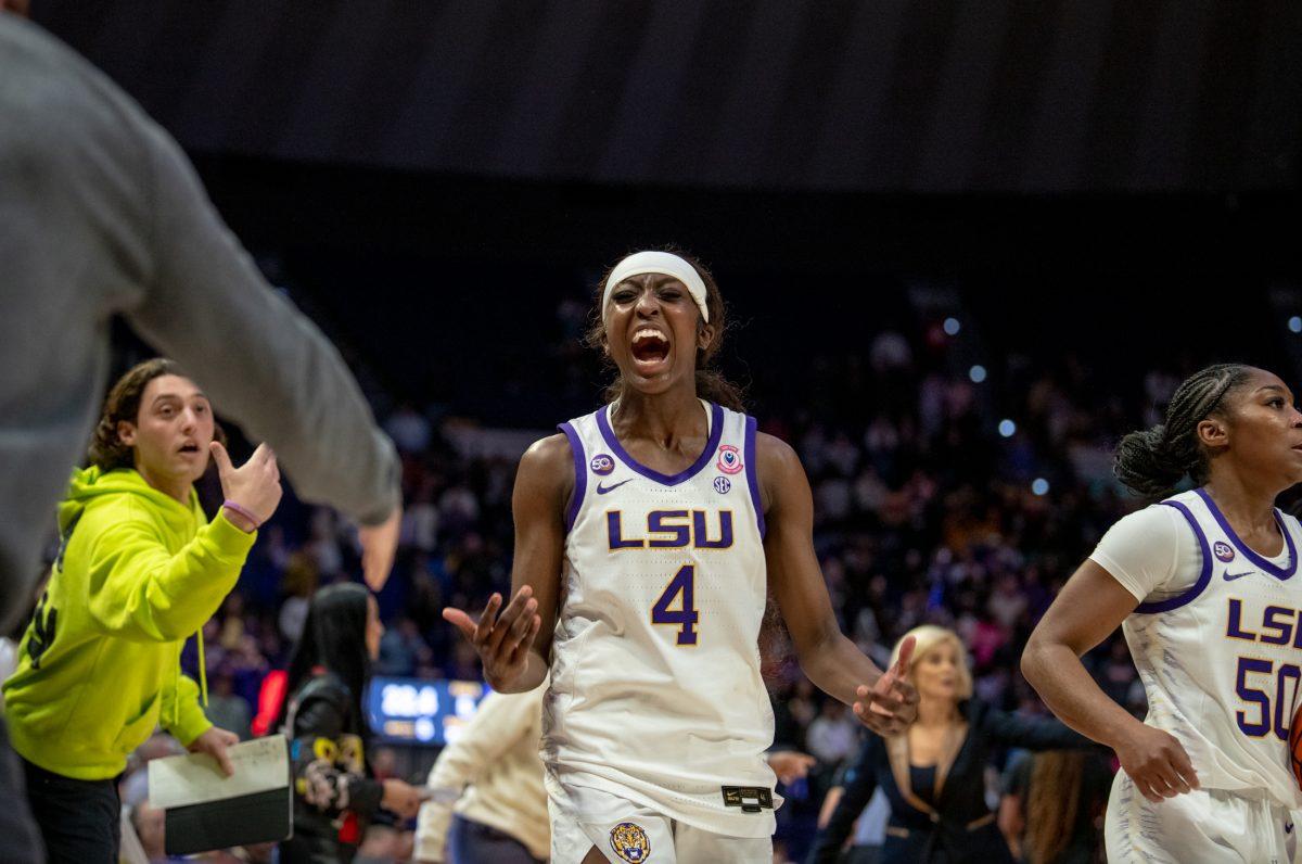 LSU women's basketball junior guard Flau&#8217;Jae Johnson (4) celebrates during LSU's 94-88 overtime win against Stanford on Thursday, Dec. 5, 2024, in the Pete Maravich Assembly Center in Baton Rouge, La.