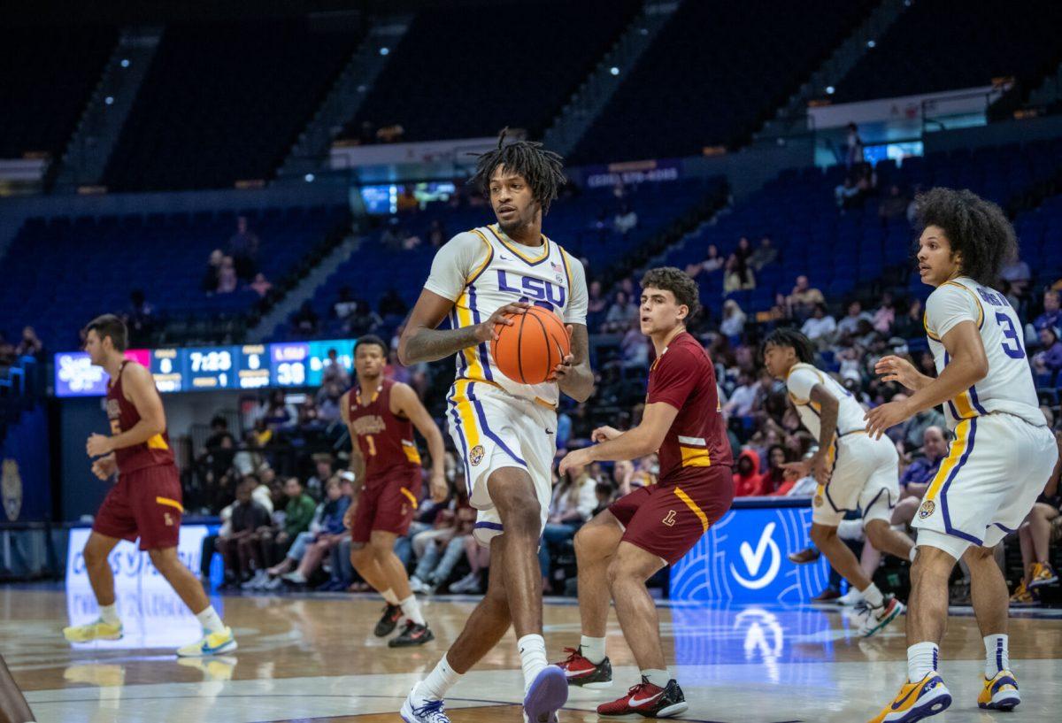 LSU men's basketball redshirt junior forward Daimion Collins (10) looks for an open pass during LSU's 110-48 exhibition win against Loyola on Tuesday, Oct. 29, 2024, in the Pete Maravich Assembly Center in Baton Rouge, La.