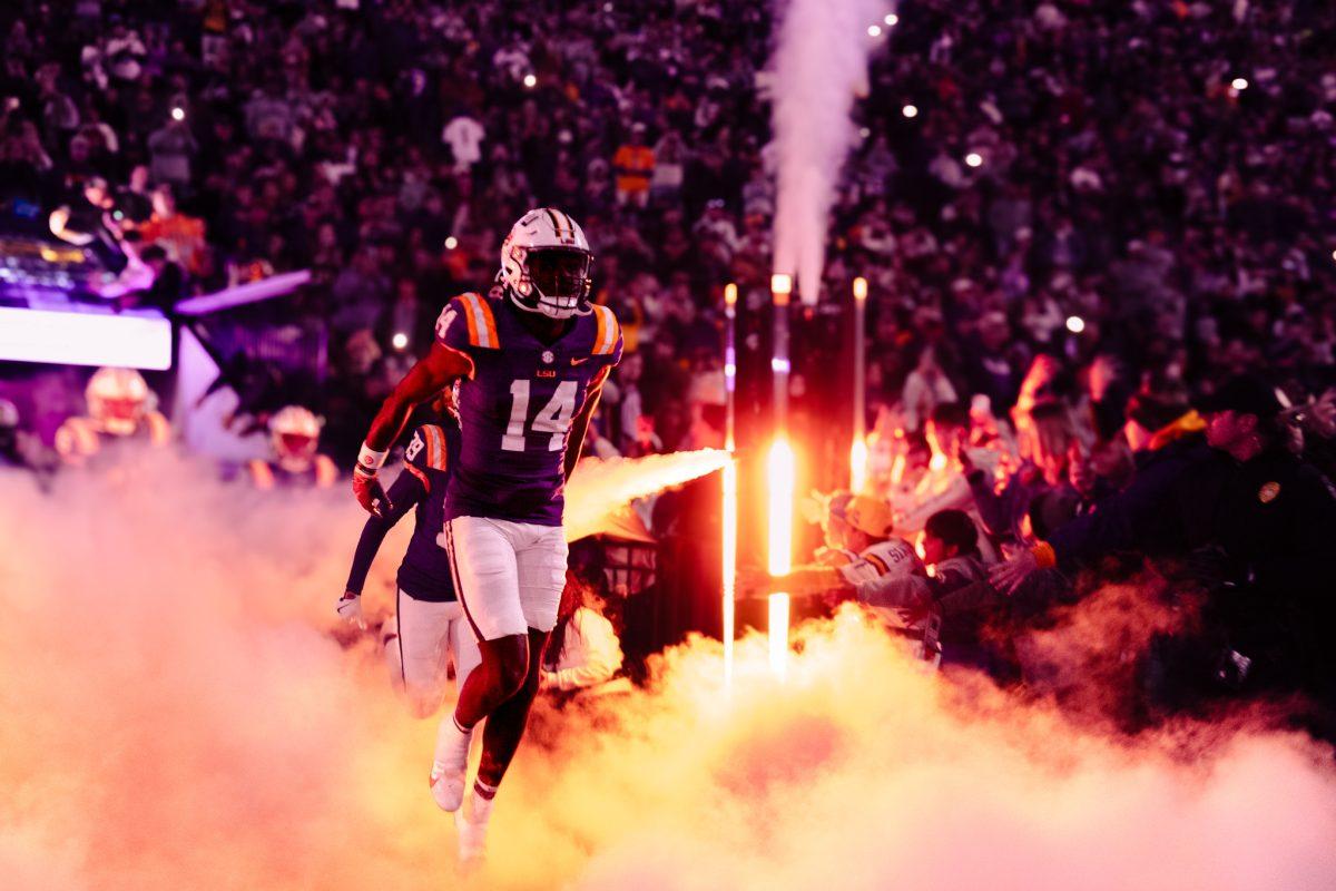 LSU football freshman tight end Trey'Dez Green (14) runs onto the field on Saturday, Nov. 30, 2024, during LSU's 37-17 win over Oklahoma at Tiger Stadium in Baton Rouge, La.