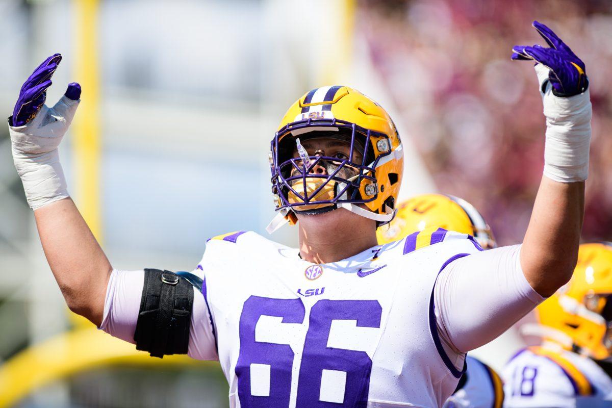 LSU football sophomore left tackle Will Campbell (66) uplifts the crowd on Saturday, Sept. 16, 2023, during LSU's 41-14 win over Mississippi State in Davis Wade Stadium in Starkville, MS.