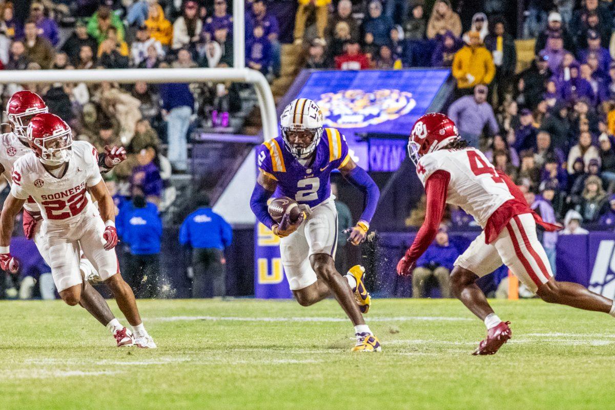 <p>LSU football 5th year senior wide receiver Kyren Lacy (2) runs with the ball Saturday, Nov. 30, 2024, during LSU's 37-17 win over Oklahoma at Tiger Stadium in Baton Rouge, La.</p>