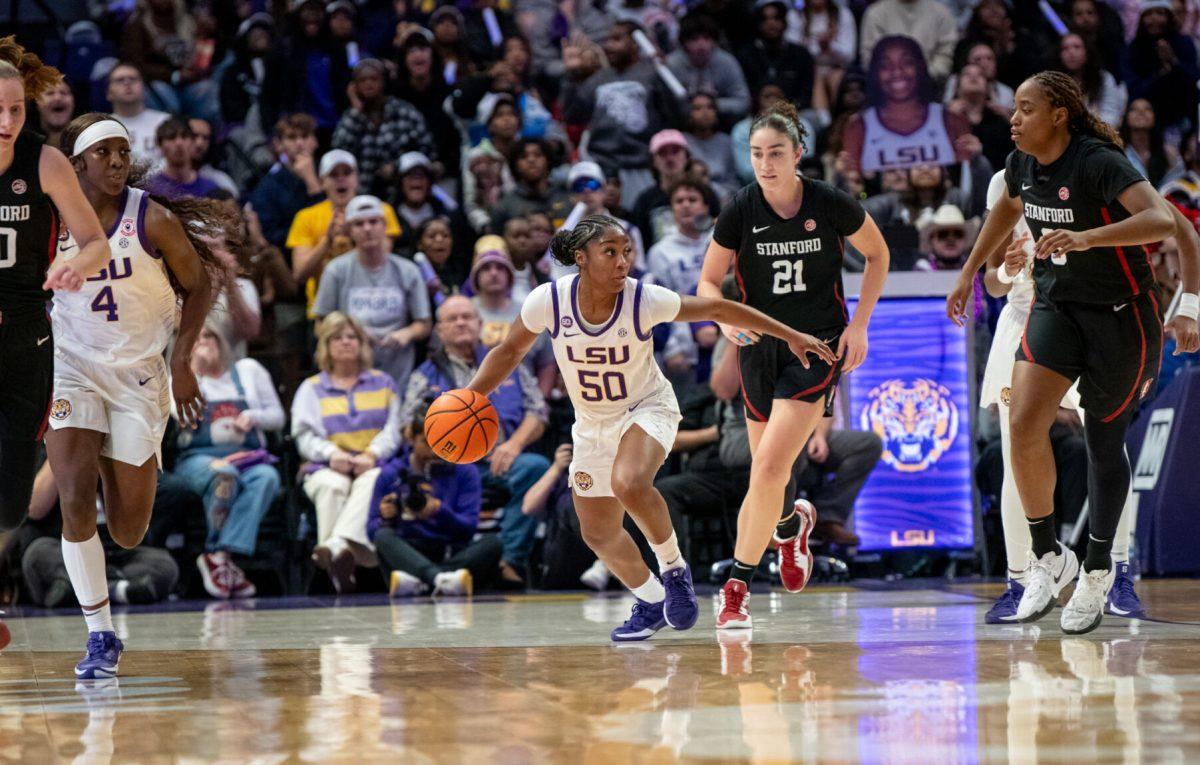 LSU women's basketball senior guard Shayeann Day-Wilson (50) runs past a Stanford player during LSU's 94-88 overtime win against Stanford on Thursday, Dec. 5, 2024, in the Pete Maravich Assembly Center in Baton Rouge, La.