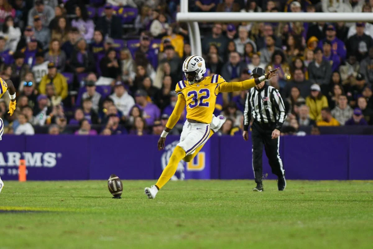 LSU football freshman placekicker Aeron Burrell (32) kicks the ball during LSU's 17-24 win against Vanderbilt on Nov 23, 2024, in Tiger Stadium in Baton Rouge, La.