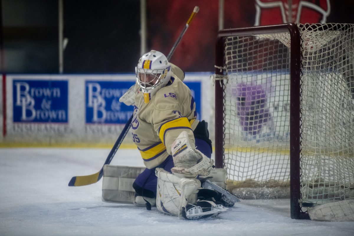 LSU club hockey PhD student goaltender Patrick Ryan (35) catches a puck in his glove during LSU's 7-3 scrimmage win against Louisiana VooDoo on Wednesday, Jan. 15, 2025, at Planet Ice Rink in Lafayette, La.