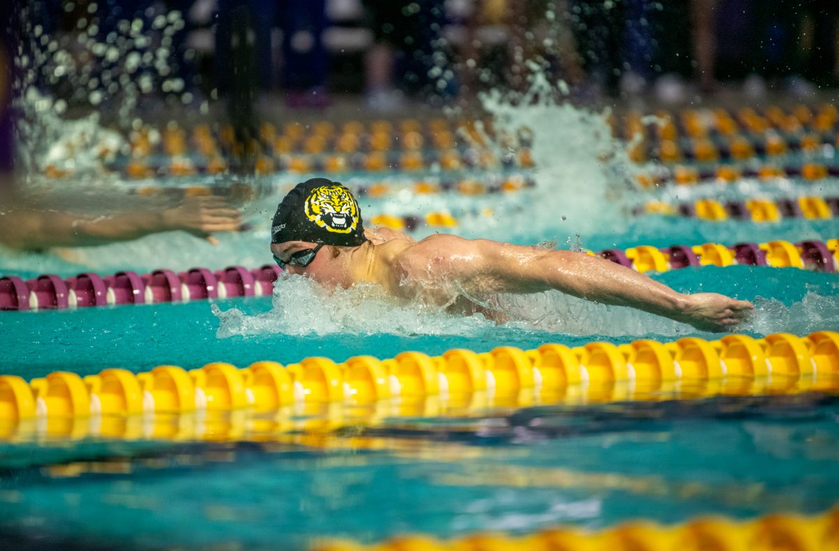 LSU swimming senior Gavin Rodgers swims the Men’s 200 fly during a win against Delta State and Cincinnati on Saturday, Jan. 25, 2025, at the LSU Natatorium on West Chimes Street in Baton Rouge, La.