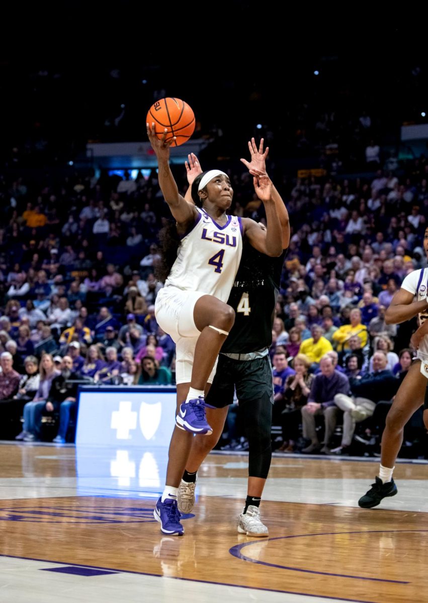 LSU women's basketball junior guard Flau’Jae Johnson (4) attempts to score during LSU's 83-77 win against Vanderbilt on Monday, Jan. 13, 2025, in the Pete Maravich Assembly Center in Baton Rouge, La.