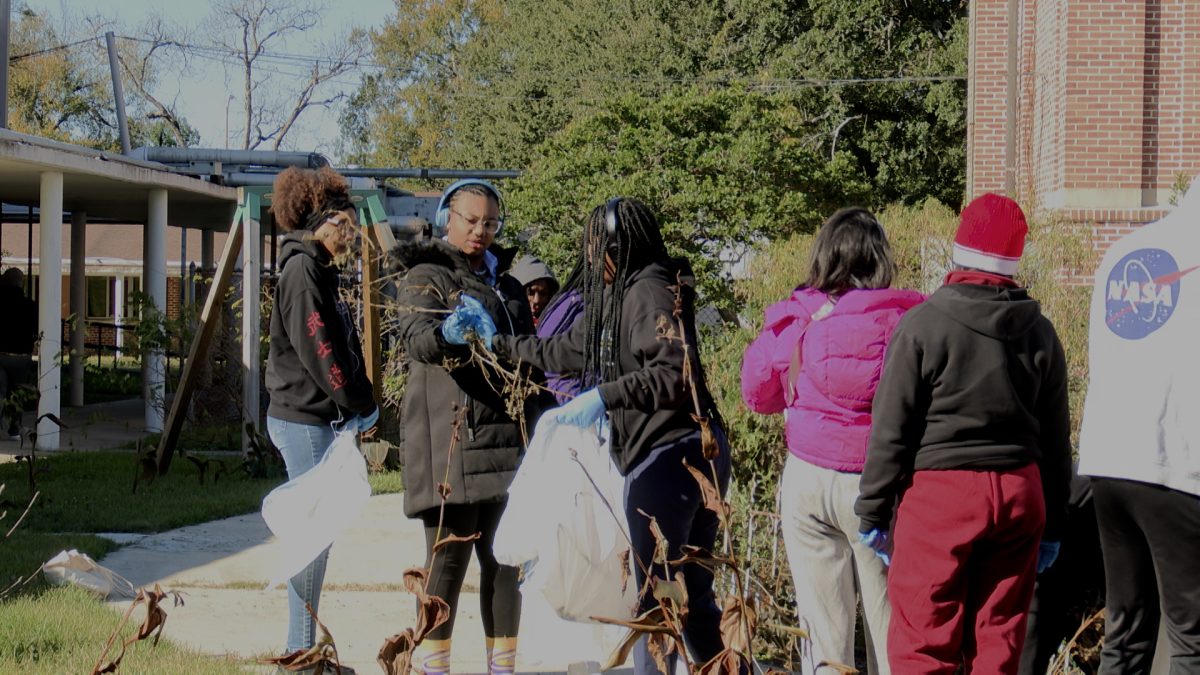 LSU Students working to clean up the Family and Youth Service Center on Government Street