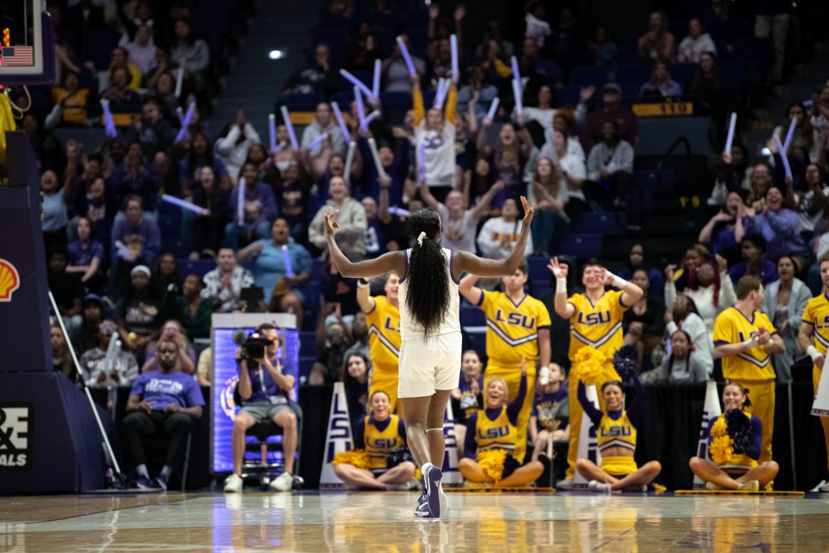 LSU women's basketball junior guard Flau’jae Johnson (4) hypes up the crowd during LSU's 81-67 win against Mississippi State on Sunday, Feb. 2, 2025, in the Pete Maravich Assembly Center in Baton Rouge, La.