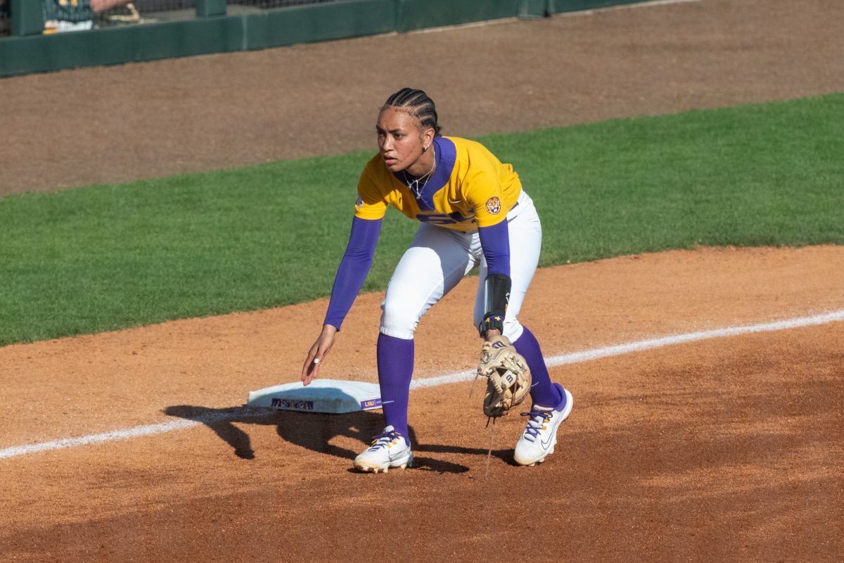 LSU softball redshirt senior Danieca Coffey (13) watches for her chance to get to home base during LSU's 3-2 win against Southeastern on Feb 9, 2025, in Baton Rouge, La.