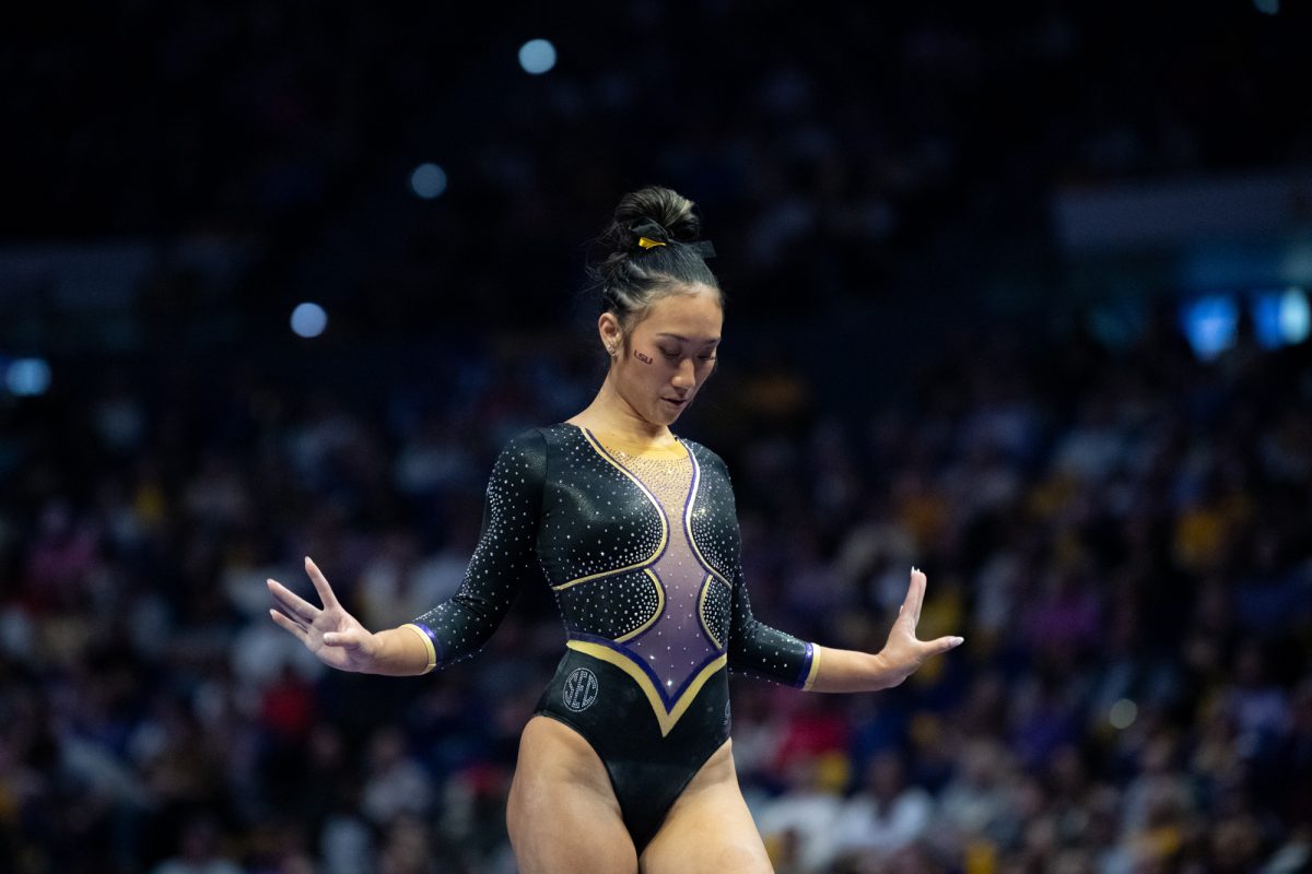 LSU gymnastics all-around freshman Kailin Chio competes on beam during LSU's 198.050-197.675 win against Oklahoma on Friday, Feb. 14, 2025, at the Pete Maravich Assembly Center in Baton Rouge, La.