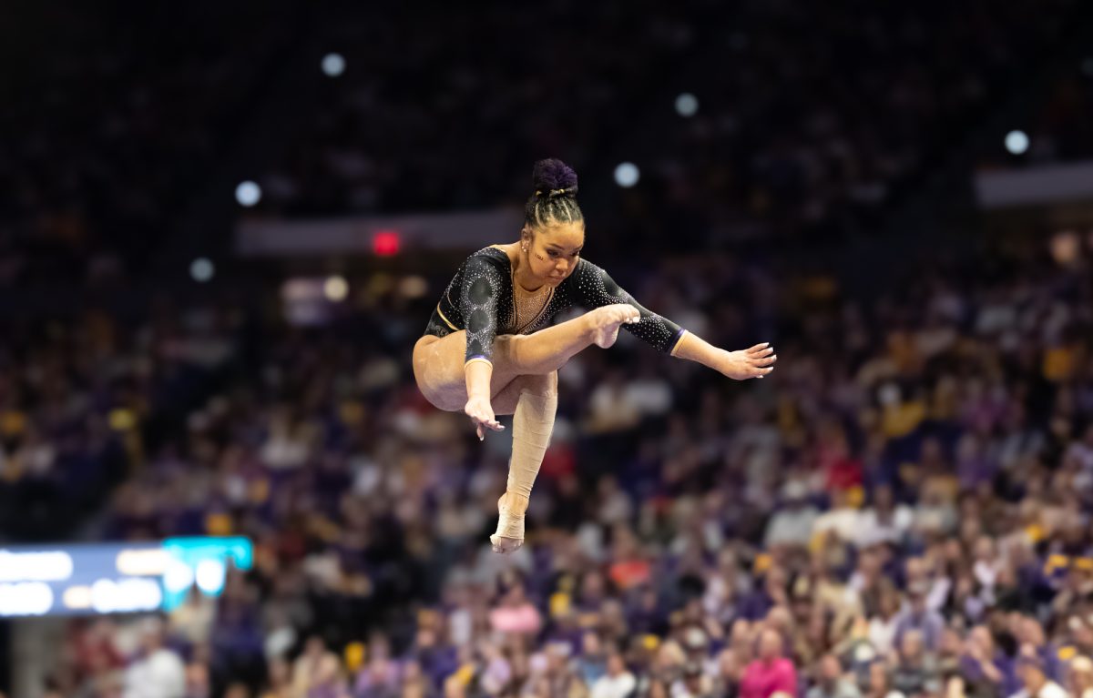 LSU gymnastics all-around sophomore Konnor McClain competes on beam during LSU's 198.050-197.675 win against Oklahoma on Friday, Feb. 14, 2025, at the Pete Maravich Assembly Center in Baton Rouge, La.