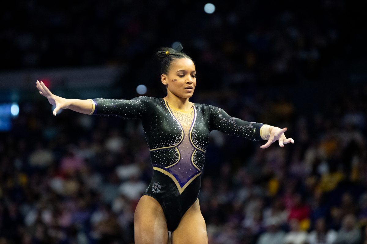 LSU gymnastics all-around graduate student Haleigh Bryant competes on beam during LSU's 198.050-197.675 win against Oklahoma on Friday, Feb. 14, 2025, at the Pete Maravich Assembly Center in Baton Rouge, La.